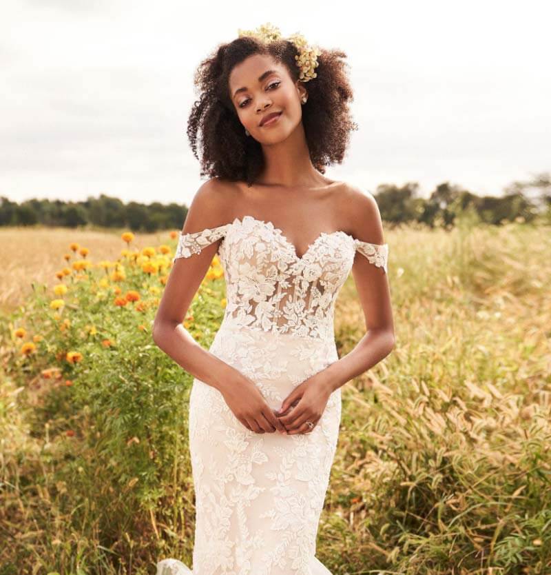 Model wearing a white gown