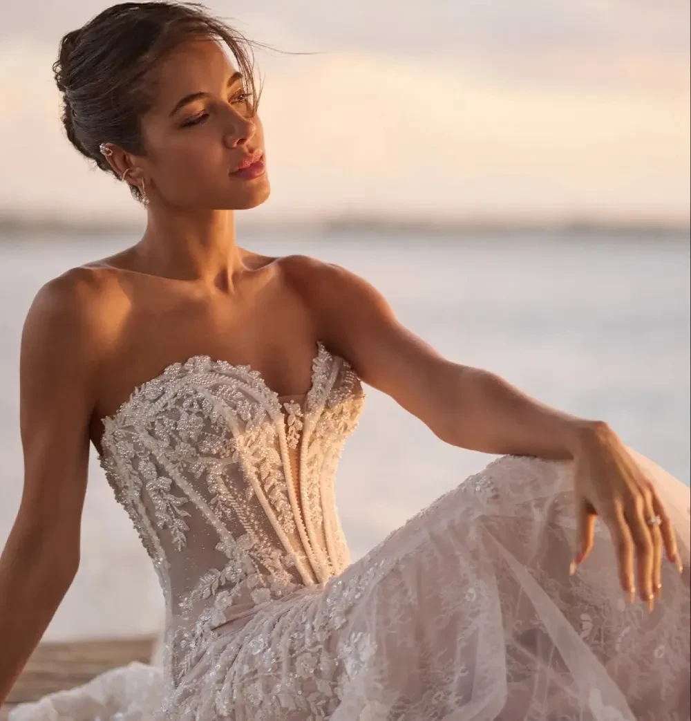 Model wearing a white gown