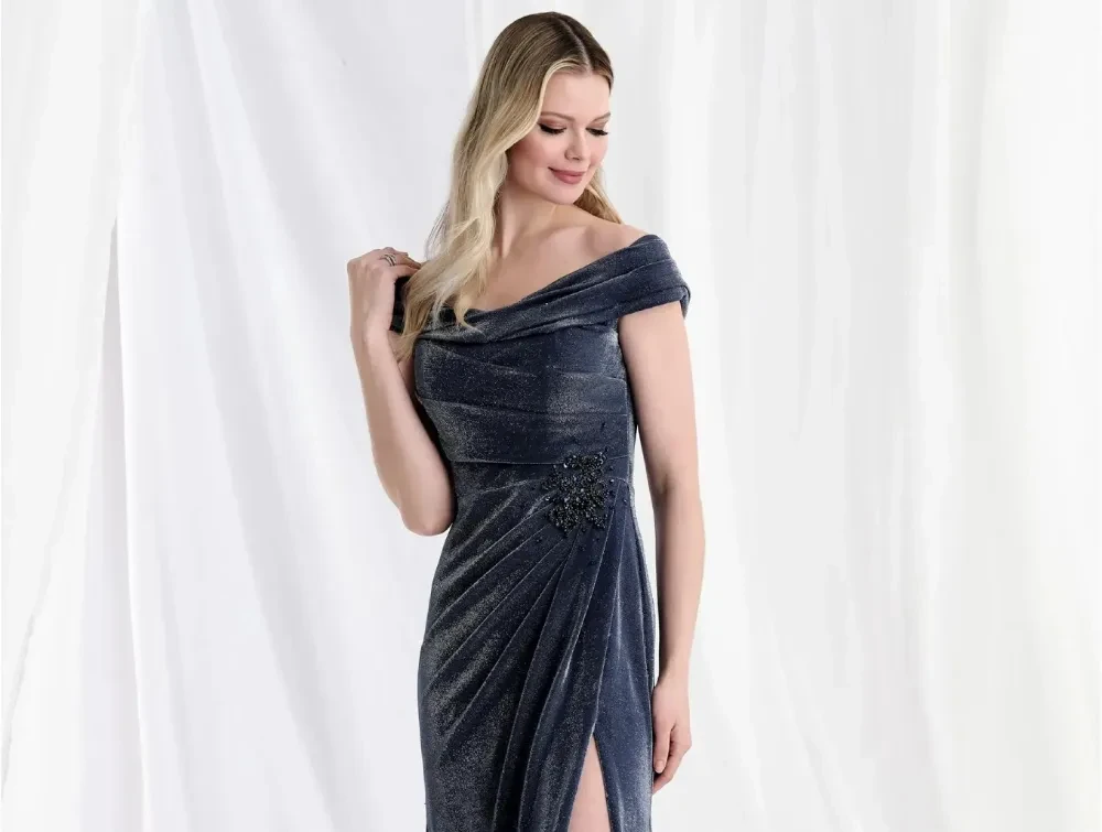 Model wearing a silver blue gown