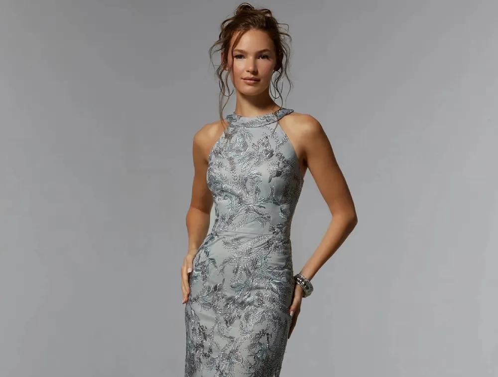 Model wearing a grey gown